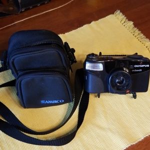 Olympus 38 mm, zoom 211 camera,